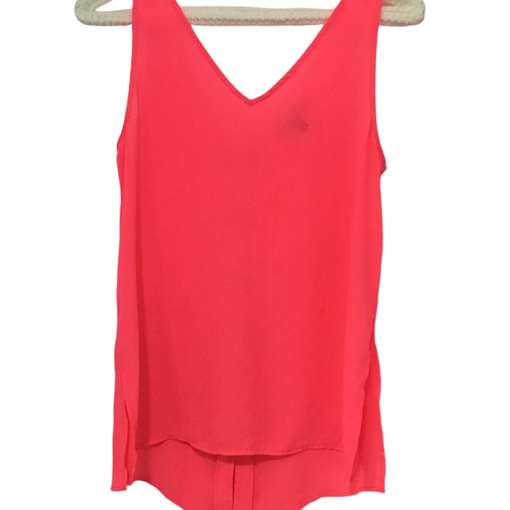 Hot pink blouse with side slits and ties on back